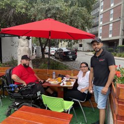 Happy customers and I am even happier because they love the food from mamajuana restaurant