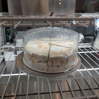Coyote Kitchen - Strawberry shortcake in the bakery case. Too full after two tacos to try dessert but I regret it because that is usually my b-day go-to! - Bars Near Me - Boone, North Carolina
