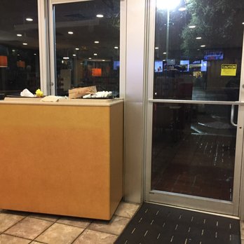 McDonald's - Why is the trash not only blocking the exit but also turned around? Note the trash on top of it. - Fast Food Near Me - Lakeland, Florida McDonald's - Why is the trash not only blocking the exit but also turned around? Note the trash on top of it. - Fast Food Near Me - Lakeland, Florida
