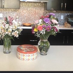 Anna's Florist & Gifts - Left is a lily arrangement. Right is florists standard choice