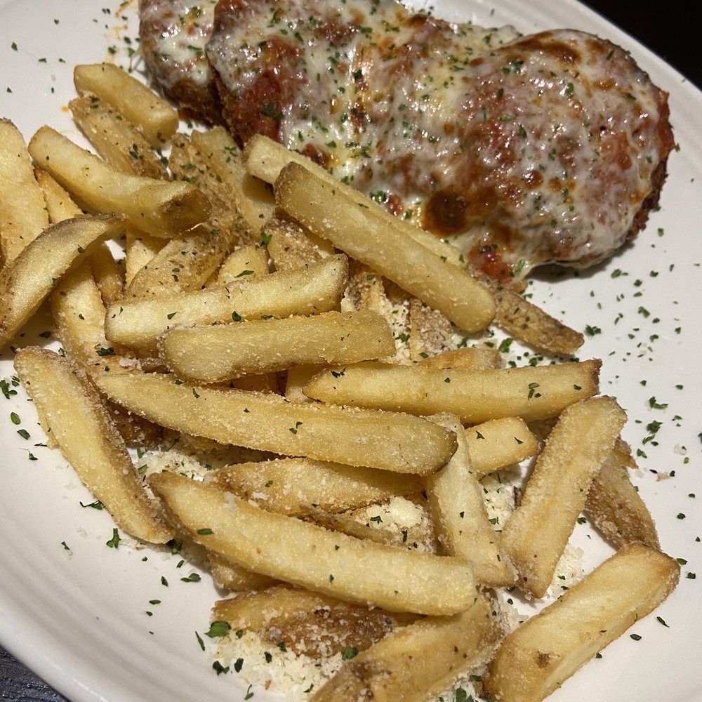 Carrabba's Italian Grill - Eggplant parmesan with truffle fries| Carrabba's USF/ Fowler | Oct 19, 2021 - Italian Near Me - Temple Terrace, Florida Carrabba's Italian Grill - Eggplant parmesan with truffle fries| Carrabba's USF/ Fowler | Oct 19, 2021 - Italian Near Me - Temple Terrace, Florida