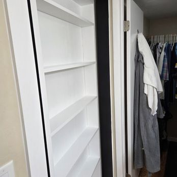 Next Day Painting - Back side of the door with shelves. First coat of paint and caulking. - Painters Near Me - Palm Coast , Florida Next Day Painting - Back side of the door with shelves. First coat of paint and caulking. - Painters Near Me - Palm Coast , Florida