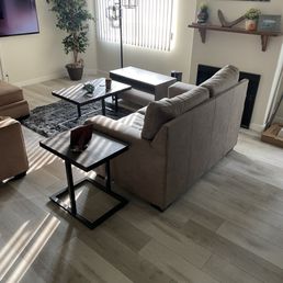 a living room with couches and a fireplace