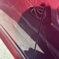 DRIVE Rental Cars - Dents and scratches all around the vehicle