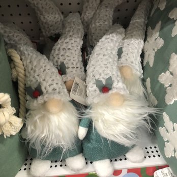 pOpshelf - Cute 11.14.22 - Two plush gnome decorations with long white beards, green outfits, and tall, knitted white hats are displayed on a store shelf. - Party Supplies Near Me - Cypress, Texas