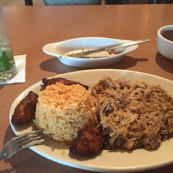Cuban Diner - Lechón tradicional with yellow rice, black beans, and sweet plantains - Cuban Near Me - Marietta, Georgia Cuban Diner - Lechón tradicional with yellow rice, black beans, and sweet plantains - Cuban Near Me - Marietta, Georgia