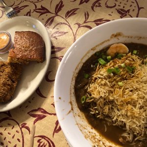Photo of The Quarters - Auburn, WA, United States. Gumbo with shrimp and a side of Fried Fish, cornbread