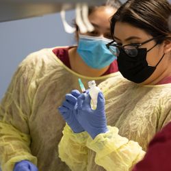 UEI College - Mesa - Medical Assistant students preparing injections.