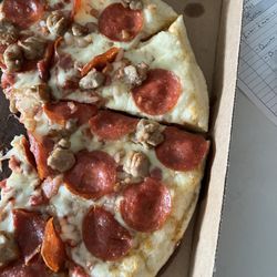 Little Caesars Pizza - 3 meat pizza suppose to be well done.