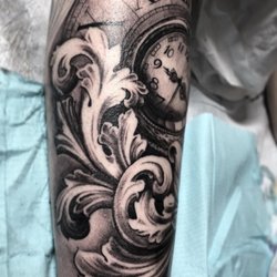 Royal Sword Tattoo & Piercing