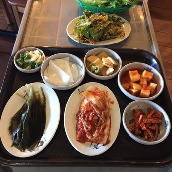 Pro Samgyubsal - Pickled garlic leaves, daikon and radishes. - Korean Near Me - Northbrook, Illinois