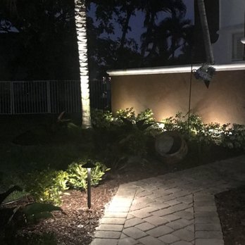 Tropical Landscape Lighting - a walkway and palm trees - Landscaping Near Me - Lake Worth, Florida Tropical Landscape Lighting - a walkway and palm trees - Landscaping Near Me - Lake Worth, Florida