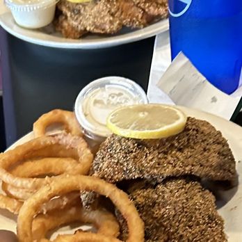 Shield's Restaurant Bar Pizzeria - This is onion rings/fried catfish and if you notice the fish was fried in like old oil or grease! All the catfish looks like this - Pizza Near Me - Troy, Michigan