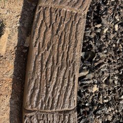 A Modern Curb Appeal - The log design used for the curbing