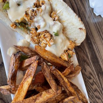 BridgeWay Brewing - Chicken Philly sandwich with fries - Brewpubs Near Me - Simpsonville, South Carolina BridgeWay Brewing - Chicken Philly sandwich with fries - Brewpubs Near Me - Simpsonville, South Carolina