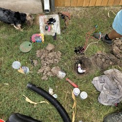 Busted irrigation systems. Fixing where it busted at.
