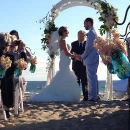 Chantal provided our beautiful floral and fabric arrangements for the arch and filled and hung our blue mason jar "pews". Love! Chantal provided our beautiful floral and fabric arrangements for the arch and filled and hung our blue mason jar "pews". Love!