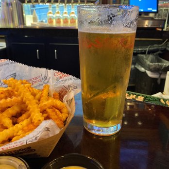 Chickie's & Pete's - Yards Philadelphia Pale Ale & Crab Fries - New American Near Me - Philadelphia, Pennsylvania
