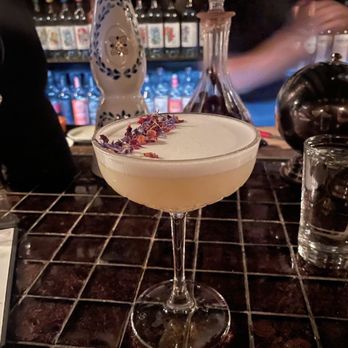 Mayamezcal - a cocktail sitting on a bar - Lounges Near Me - New York, New York Mayamezcal - a cocktail sitting on a bar - Lounges Near Me - New York, New York