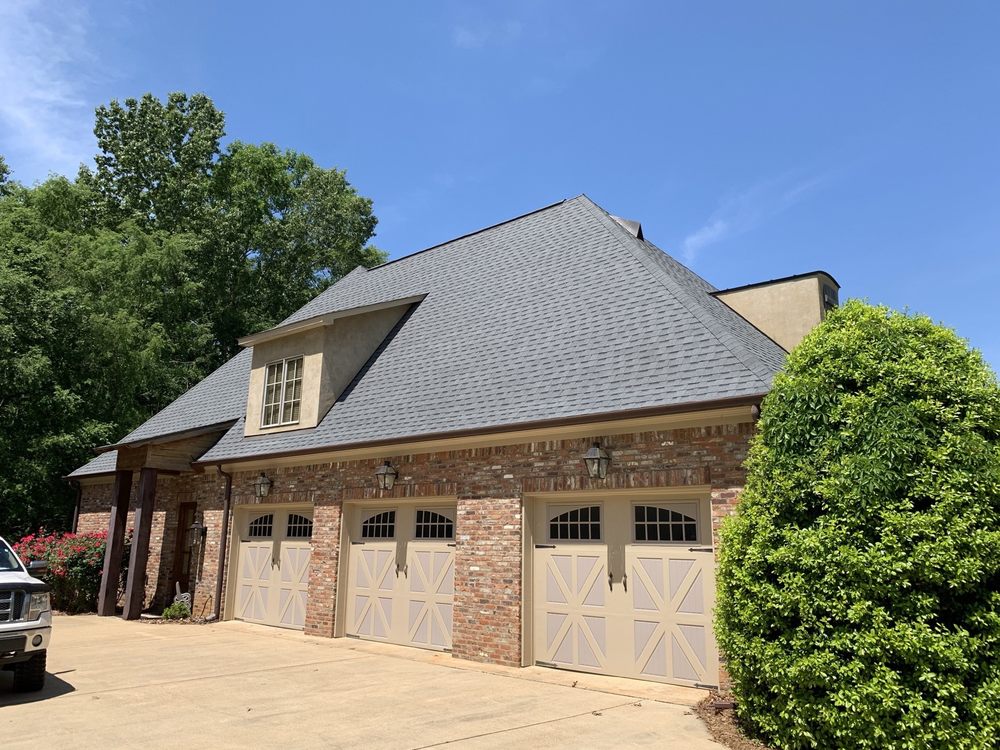 Slide of Hayman's Roofing