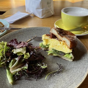 Creekside Bakery - Splitting a breakfast sandwich. You get a choice of bacon or sausage - Bakeries Near Me - Novato, California Creekside Bakery - Splitting a breakfast sandwich. You get a choice of bacon or sausage - Bakeries Near Me - Novato, California