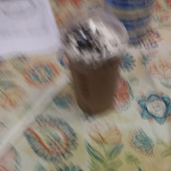McDonald's - a cup of coffee on a table - Burgers Near Me - St. Louis, Missouri