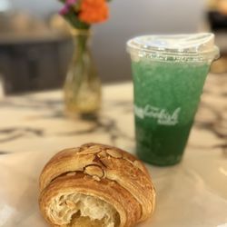 The Bookish Shop - Almond croissant with energy drink