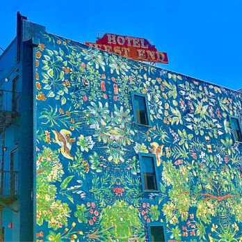 Simonette - Art Mural on hotel side wall - French Near Me - Culver City, California Simonette - Art Mural on hotel side wall - French Near Me - Culver City, California
