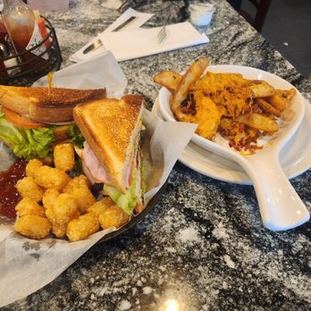 Granny’s Kitchen - Chicken club sandwich, tator tots, and potato wedges with cheese and bacon. - Breakfast & Brunch Near Me - Oklahoma City, Oklahoma Granny’s Kitchen - Chicken club sandwich, tator tots, and potato wedges with cheese and bacon. - Breakfast & Brunch Near Me - Oklahoma City, Oklahoma
