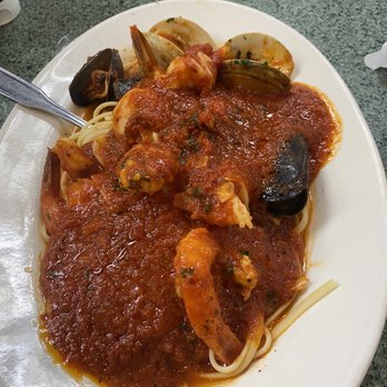 Randazzo's Clam Bar - Shrimp Fra Diavolo on a Bed of Pasta - Seafood Near Me - Brooklyn, New York Randazzo's Clam Bar - Shrimp Fra Diavolo on a Bed of Pasta - Seafood Near Me - Brooklyn, New York