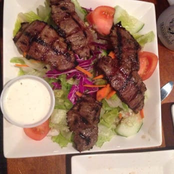Spanky's Shenanigans - Flank steak on house salad - Pubs Near Me - Leesburg, Virginia