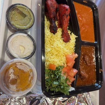 Sizzling Indian Kitchen - Plate with butter chicken and lamb masala, side of tandoori chicken - Indian Near Me - Happy Valley, Oregon Sizzling Indian Kitchen - Plate with butter chicken and lamb masala, side of tandoori chicken - Indian Near Me - Happy Valley, Oregon