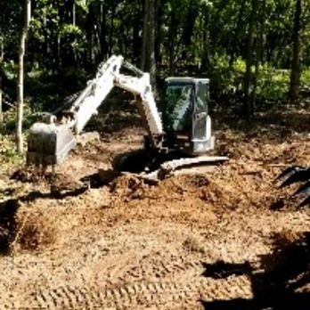 WV Equipment Specialists - a small excavator in the woods - Farm Equipment Repair Near Me WV Equipment Specialists - a small excavator in the woods - Farm Equipment Repair Near Me