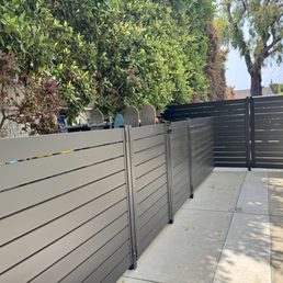 Aluminum garbage and bike storage and gate to front yard Aluminum garbage and bike storage and gate to front yard