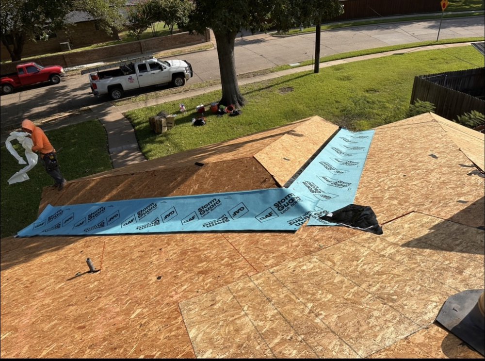 Slide of Homer’s Roofing & Construction