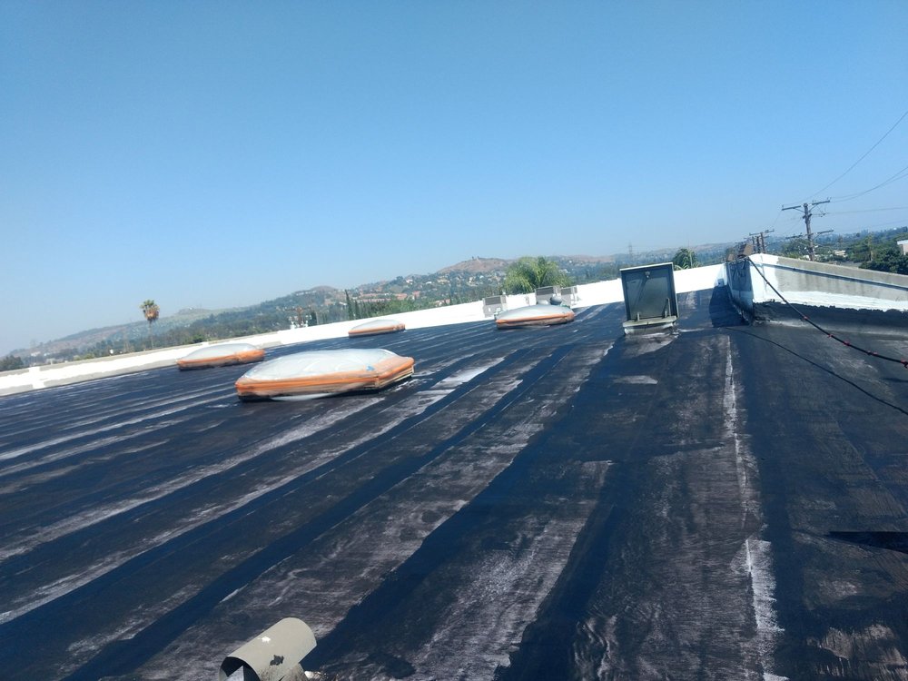 Slide of Benitez Roofing & Waterproofing