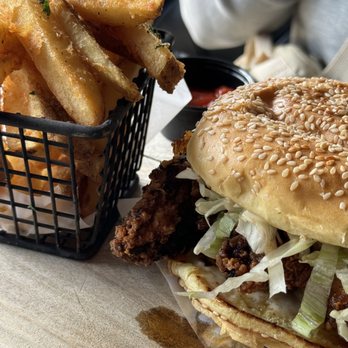 Premiere on Broadway - Nashville chicken sandwich and fries - Music Venues Near Me - Somerville, Massachusetts Premiere on Broadway - Nashville chicken sandwich and fries - Music Venues Near Me - Somerville, Massachusetts