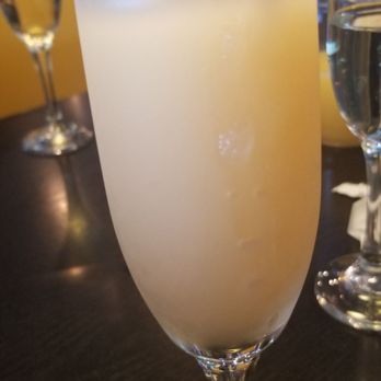 District 7 Grill - Frozen peach bellini - Breakfast & Brunch Near Me - Houston, Texas District 7 Grill - Frozen peach bellini - Breakfast & Brunch Near Me - Houston, Texas