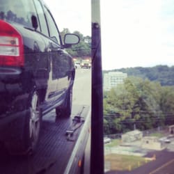 Samantha's Towing & Recovery - Waiting on the side of 476 in the truck while he was at the accident site..... For 40 minutes and didn't even hook the car.