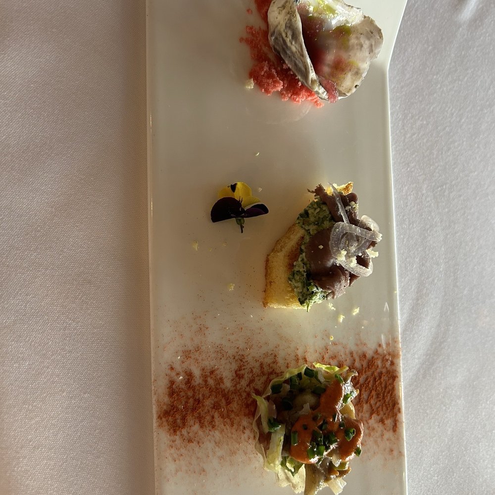 First course, Trio of Moro Bay Oysters, Hollandaise, Bacon Mignonette and Abolone