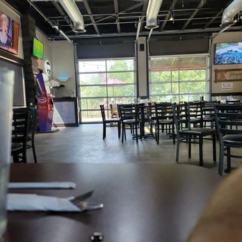 Sidelines Sports Eatery - Norwalk - empty tables and chairs in a restaurant - American Near Me - Norwalk, Ohio Sidelines Sports Eatery - Norwalk - empty tables and chairs in a restaurant - American Near Me - Norwalk, Ohio