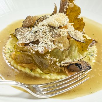 Elizabeth's - Deep, earthy richness: truffle-topped royal trumpet mushroom raviolo with a white wine reduction - Vegan Near Me - Washington, DC, District of Columbia Elizabeth's - Deep, earthy richness: truffle-topped royal trumpet mushroom raviolo with a white wine reduction - Vegan Near Me - Washington, DC, District of Columbia