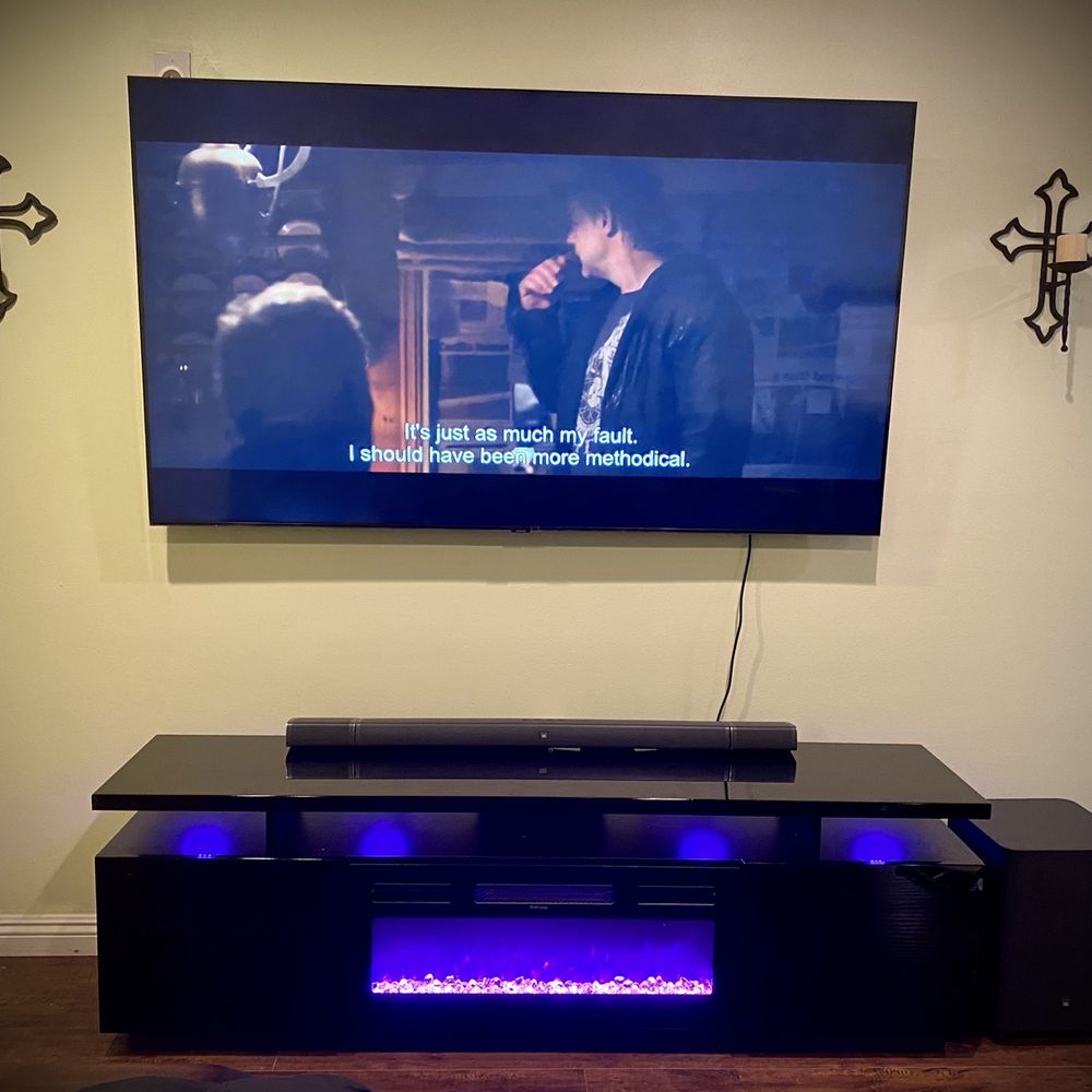 Tixan Construction - 75" TV mount.  70" Fireplace cabinet assembly. - General Contractors Near Me