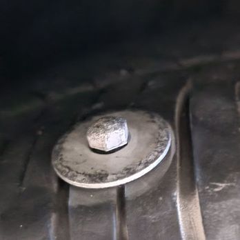 Exotic Motors Auto Rebuild - Bolt in tire we discovered as soon as we got home. Thought it was a rock when we drove away from Exotic Motors Auto Rebuild. - Body Shops Near Me - Bellevue, Washington Exotic Motors Auto Rebuild - Bolt in tire we discovered as soon as we got home. Thought it was a rock when we drove away from Exotic Motors Auto Rebuild. - Body Shops Near Me - Bellevue, Washington