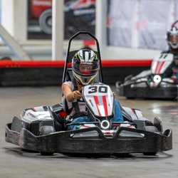K1 Speed Harrisburg - A teenager races in a go-kart at K1 Speed Harrisburg during a teen birthday party.