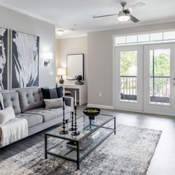 100 South Luxury Apartments - Living Room with Private Patio