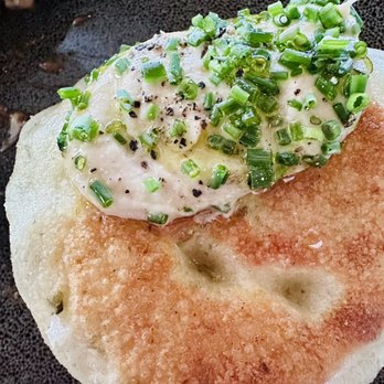 Maxwells Trading - The famous scallion griddle w/ a dollop of French onion dip. Highlight ! - New American Near Me - Chicago, Illinois Maxwells Trading - The famous scallion griddle w/ a dollop of French onion dip. Highlight ! - New American Near Me - Chicago, Illinois