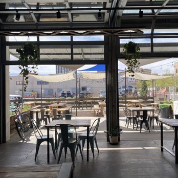 Gravity Bound Brewing - Inside looking out - garage doors for open atmosphere - Brewpubs Near Me - Albuquerque, New Mexico