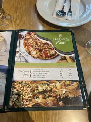 Bombay to Kathmandu Kitchen,Curry Pizza and bar by null