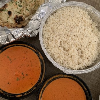 Monsoon Eclectic Modern Indian - Two Chicken Tikka Masalas (medium spice level) and a side of Garlic Naan to go - Indian Near Me - Hampton, Virginia